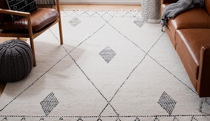A clean Hooked area rug placed in beautiful living room