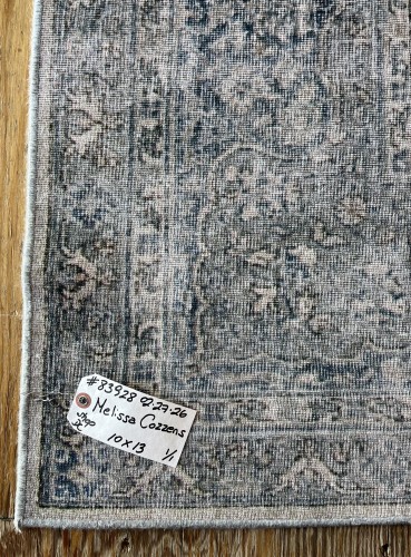 Close-up of a patterned rug detail after professional treatment for pet stains and odor removal.