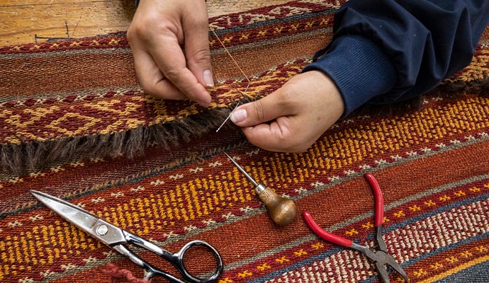 Repairing rug border and edge